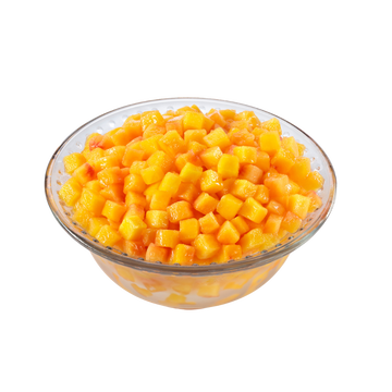 Vibrant diced mango in a clear bowl, showcasing fresh, juicy tropical fruit delights.