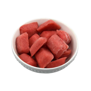 Frozen watermelon cubes in a white bowl, perfect for healthy, refreshing snacks.