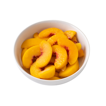 Freshly sliced peaches in a white bowl, showcasing vibrant summer colors and juicy textures.