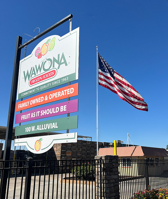 Wawona Frozen Foods sign highlighting quality frozen fruit products and family-owned values.